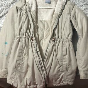 Doesn’t fit so good anymore on me. Would like to just sell it. Has some stains.